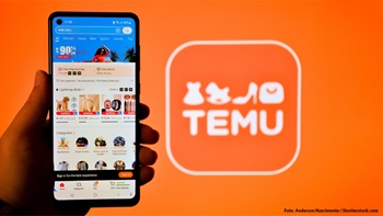 Smartphone con app Temu e logo arancione
